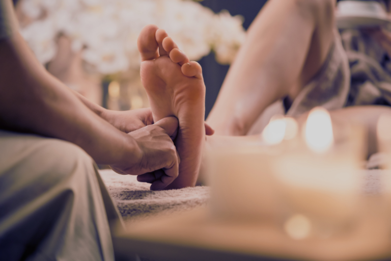man enjoying foot massage